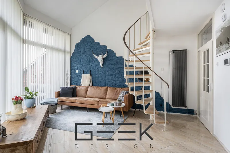 Living room with spiral stairs